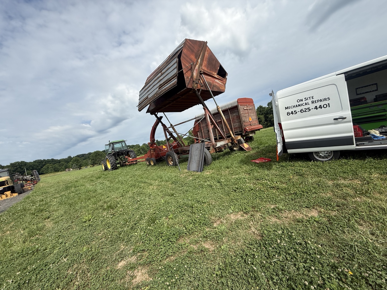 Fierce Auto Repair service van beside agricultural harvesting equipment